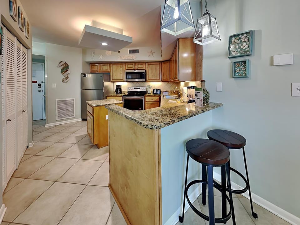 Kitchen or kitchenette, Seating area, furniture, microwave, oven, stove