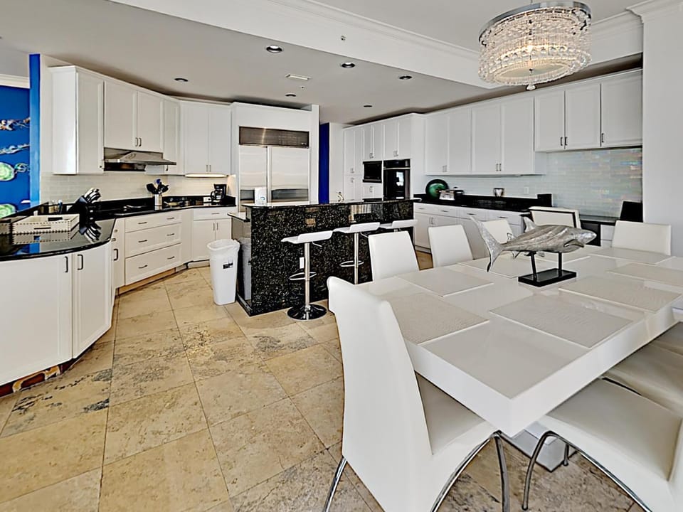Kitchen or kitchenette, Seating area, Dining area, furniture, microwave, oven, stove