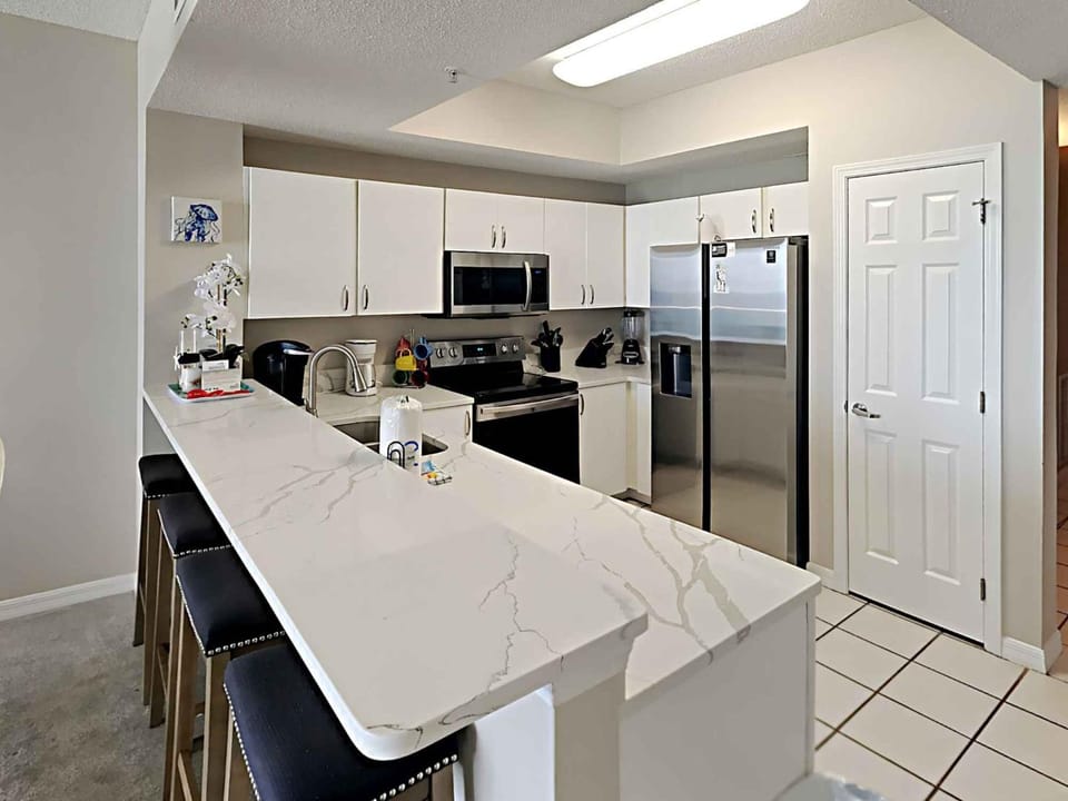 Kitchen or kitchenette, microwave, oven, stove, kitchen