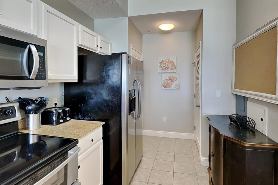 Kitchen or kitchenette, microwave, stove, kitchen