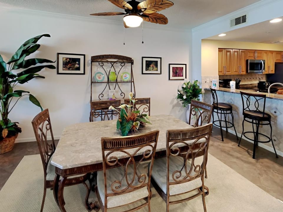 Kitchen or kitchenette, Dining area, furniture, microwave, air conditioner
