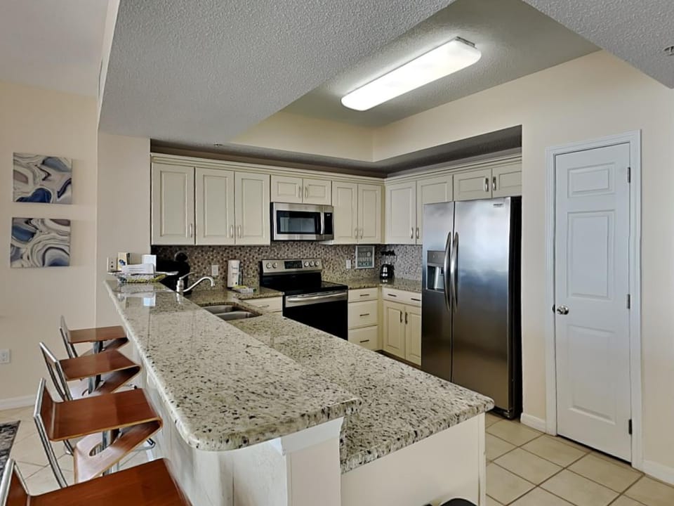 Kitchen or kitchenette, microwave, oven, stove, kitchen