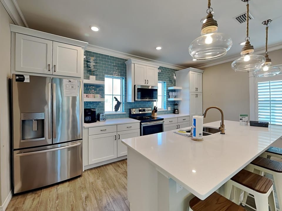 Kitchen or kitchenette, dishwasher, furniture, microwave, oven, kitchen