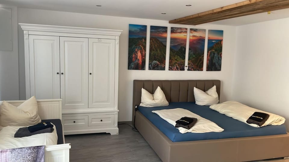Bed, Living room, Photo of the whole room, Bedroom, towels, wardrobe
