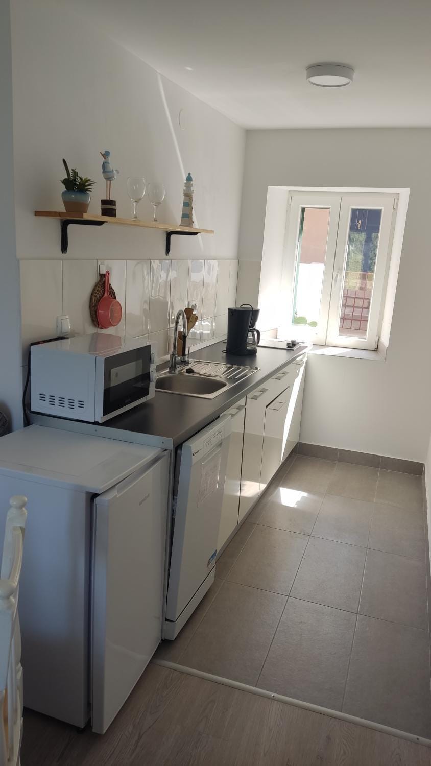 Kitchen or kitchenette, stove