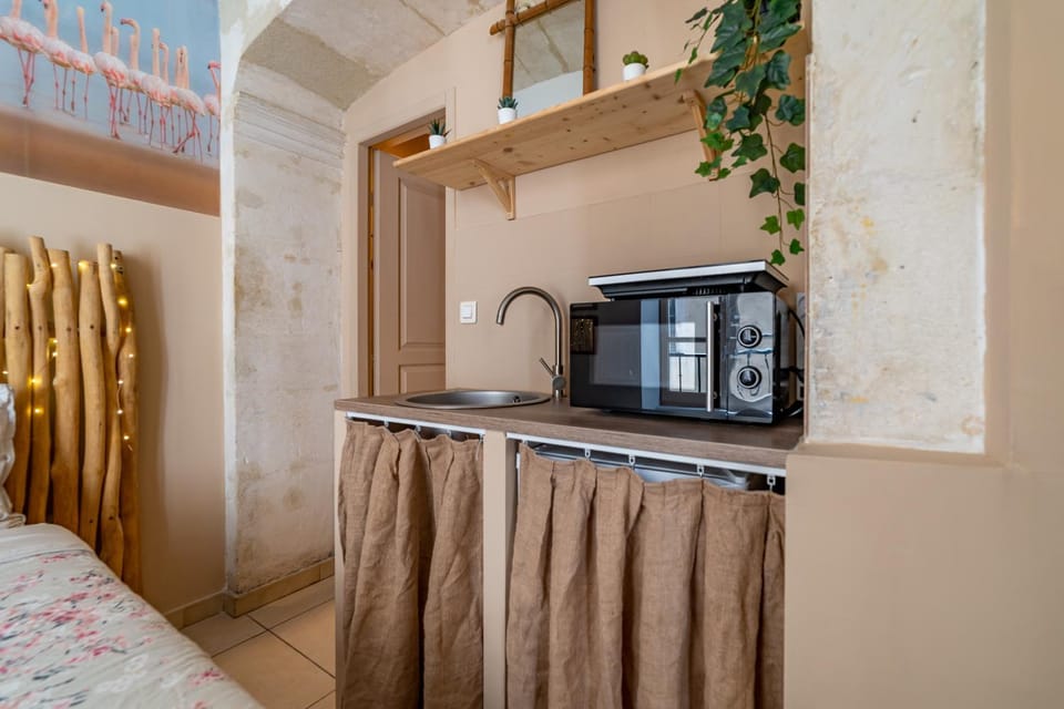 Kitchen or kitchenette, stove