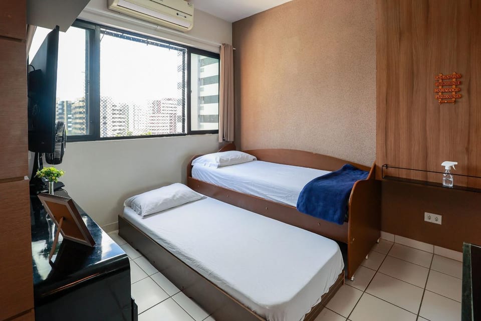 Bed, air conditioner