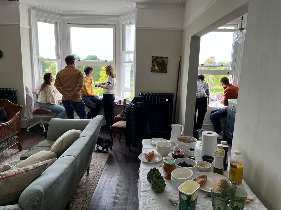 People, Living room, Seating area, Dining area, Food, group of guests