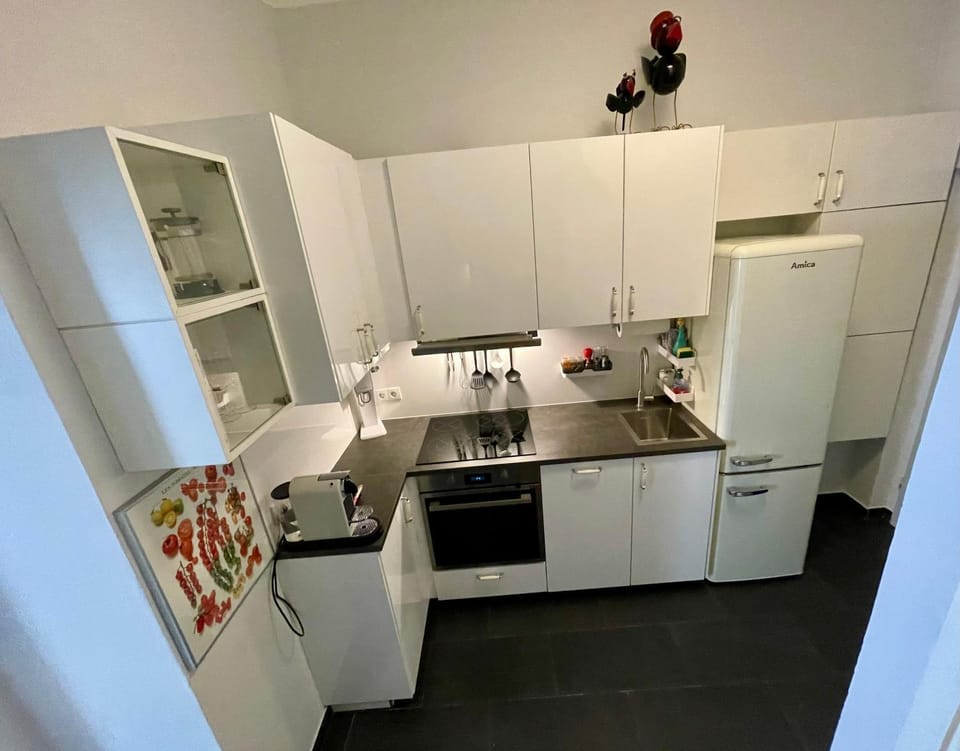Kitchen or kitchenette, dishwasher, oven, stove, toaster