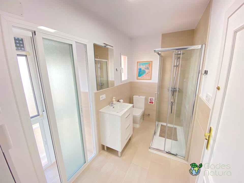 Shower, Toilet, Bathroom, furniture, towels, washing machine