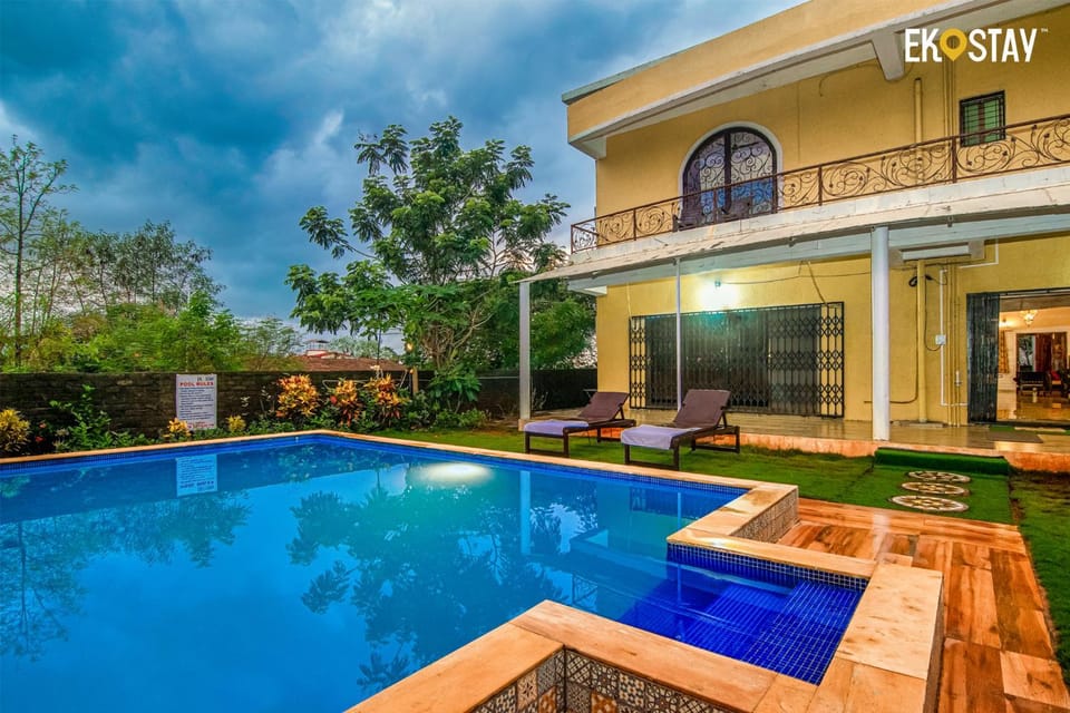 Property building, Day, Natural landscape, Pool view, Swimming pool, sunbed