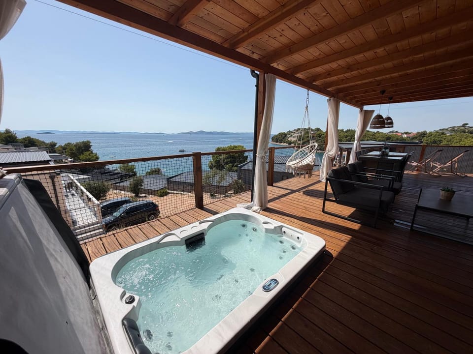 Hot Tub, View (from property/room), Balcony/Terrace, Seating area, Sea view, Sunset
