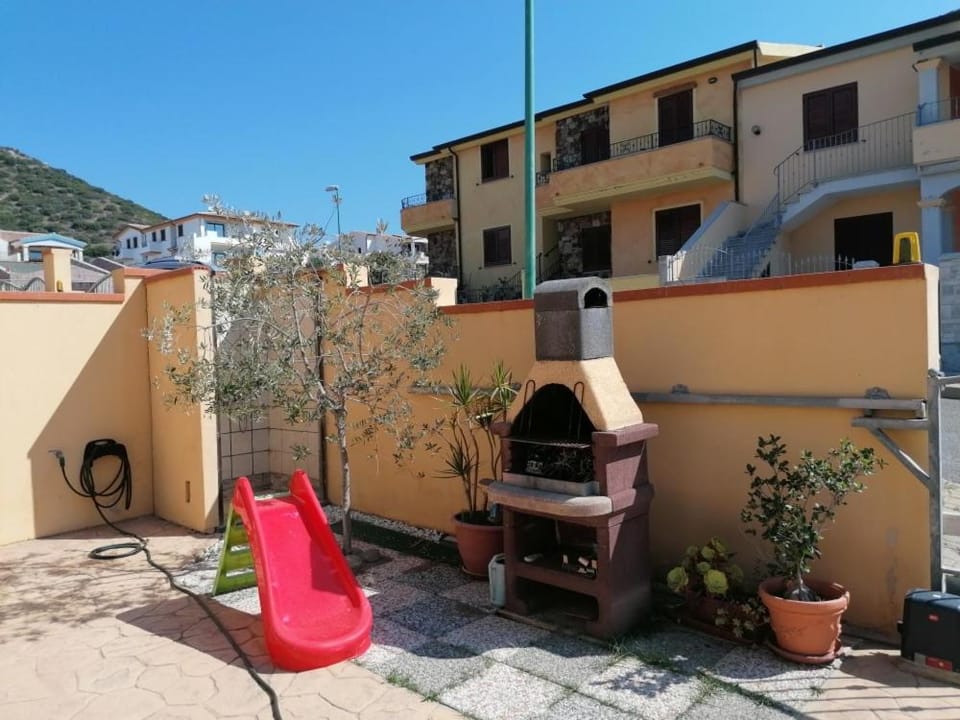 La Caletta Vista mare giardino House in La Caletta