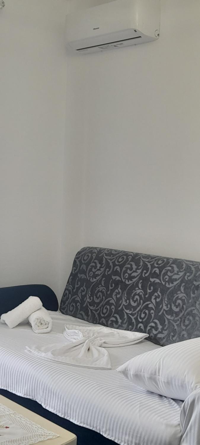 Bed, Photo of the whole room, Bedroom, towels, air conditioner