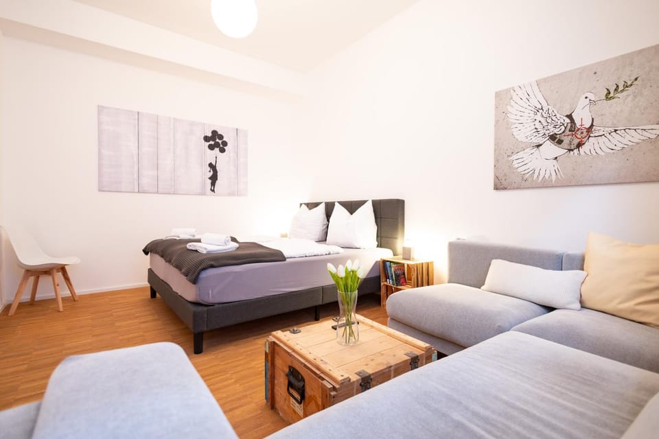 Bed, Living room, Seating area, Bedroom