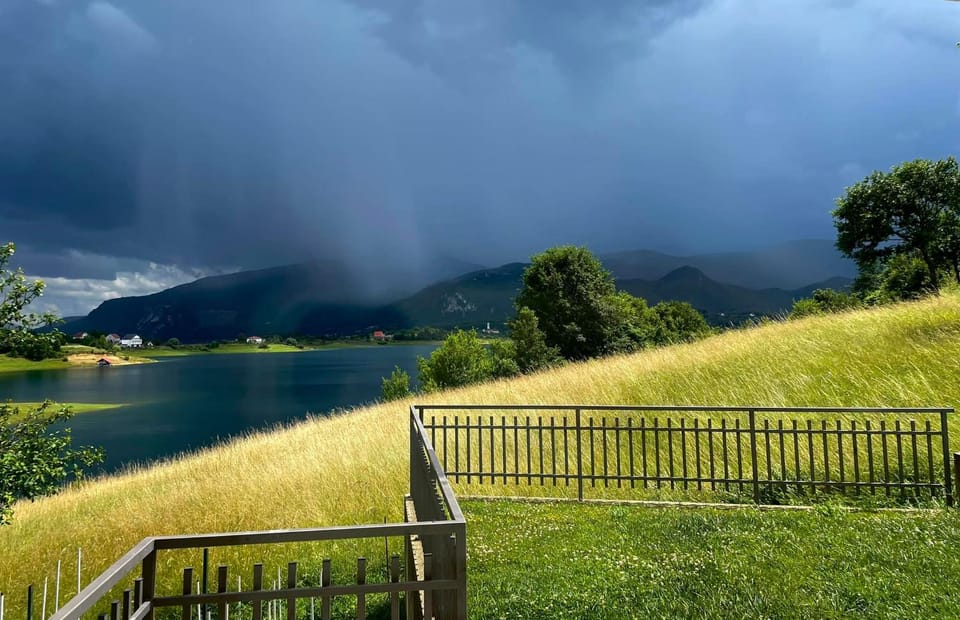 Property building, Nearby landmark, Natural landscape, Lake view, Mountain view