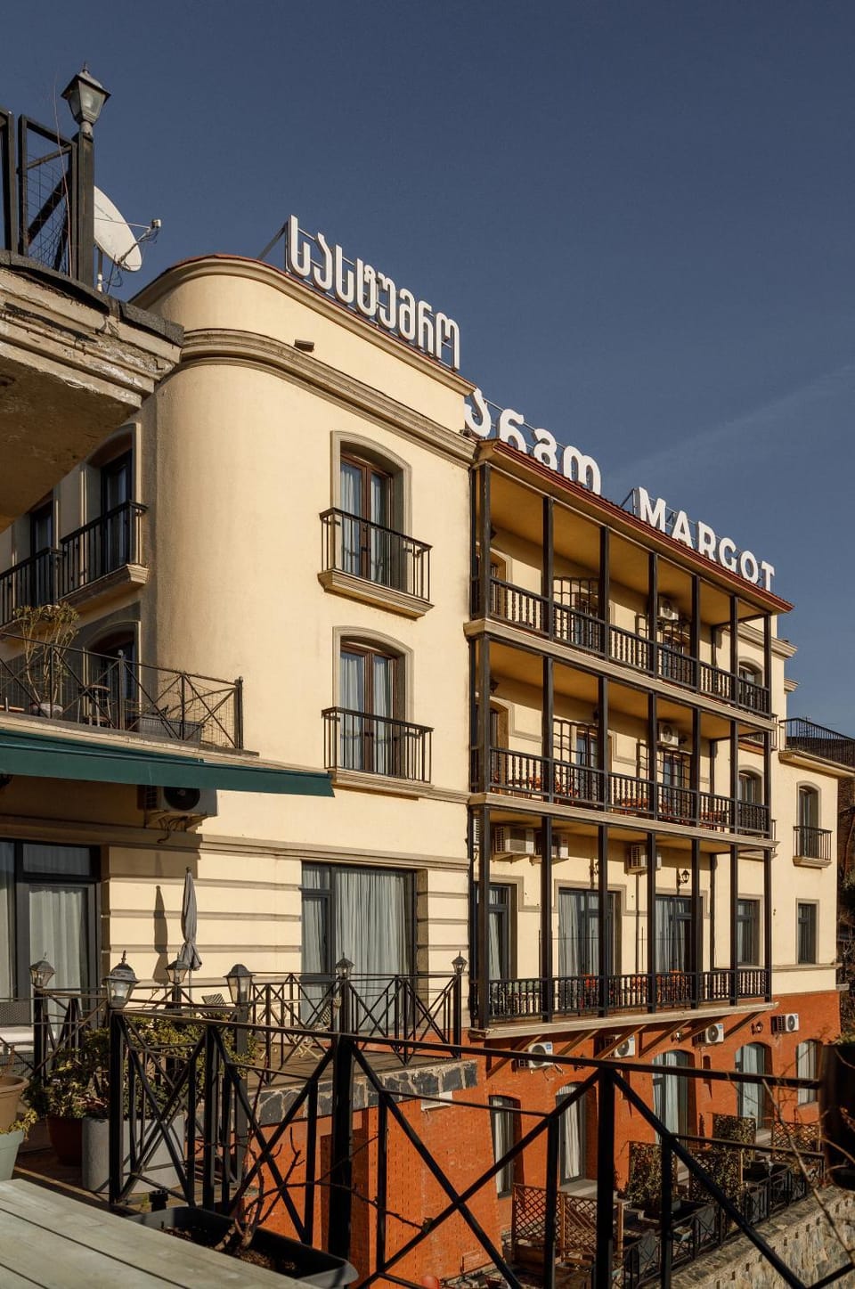 Property building, Facade/entrance, Day, View (from property/room), Balcony/Terrace, Logo/Certificate/Sign, Sunset