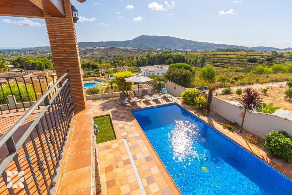 Property building, Nearby landmark, Spring, Day, Natural landscape, Bird's eye view, Mountain view, Pool view, Swimming pool, sunbed