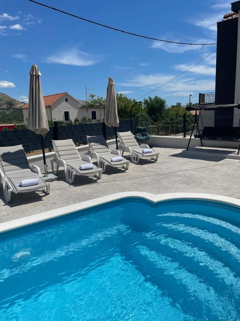 Swimming pool, sunbed