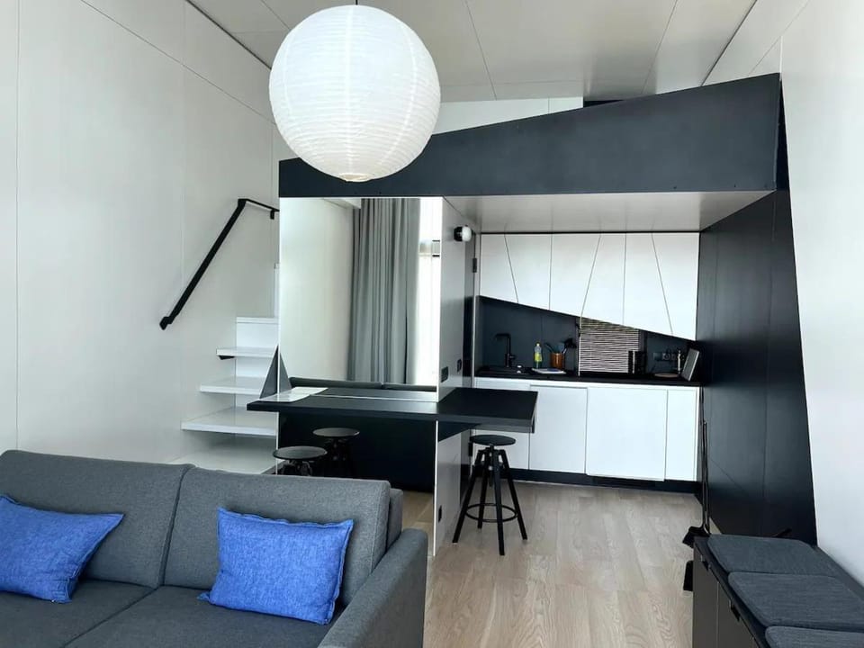 Kitchen or kitchenette, Living room, Seating area, Dining area