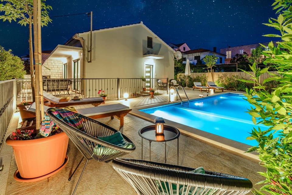 Property building, Patio, Night, Natural landscape, View (from property/room), Balcony/Terrace, Pool view, Swimming pool, sunbed