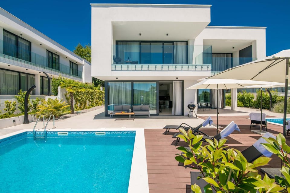 Property building, Patio, Swimming pool, sunbed