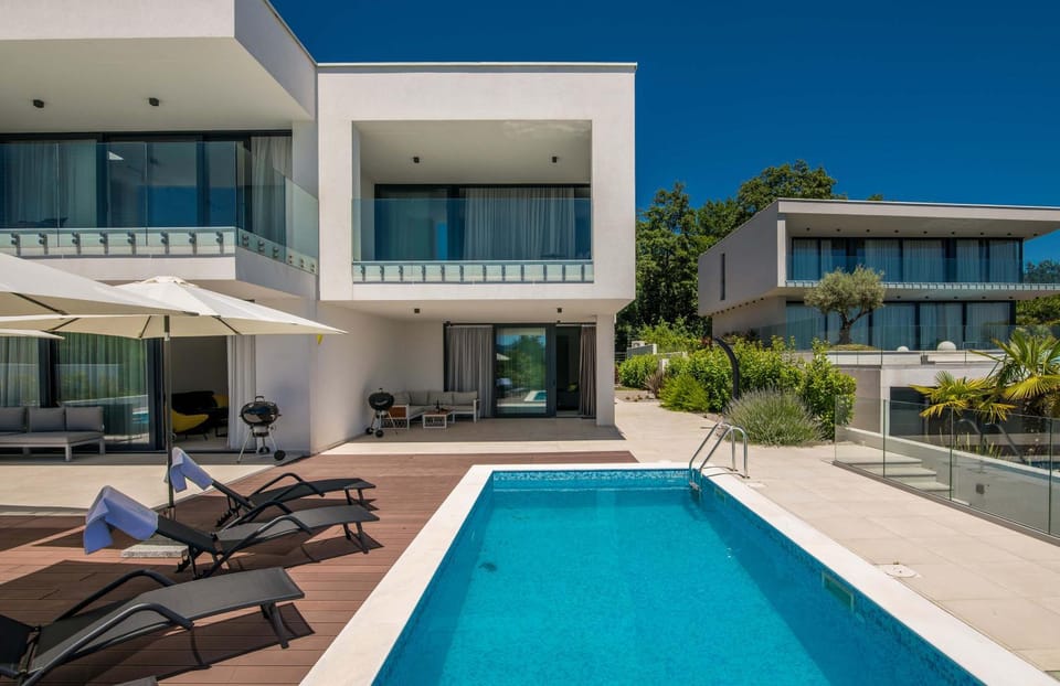 Property building, Patio, Swimming pool, sunbed