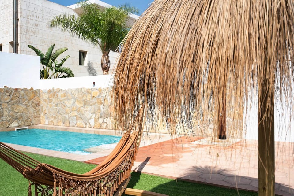 Property building, Living room, Swimming pool