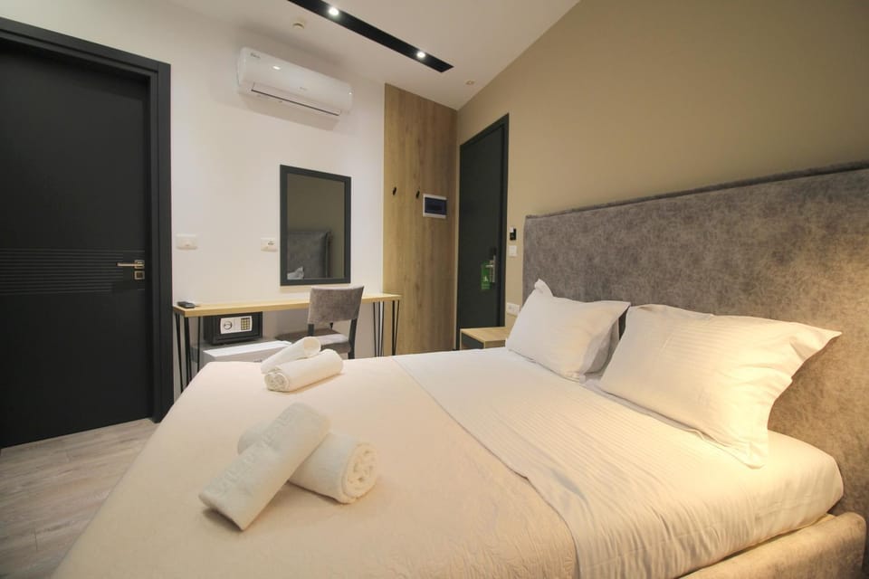 Bed, Photo of the whole room, Bedroom, towels, air conditioner