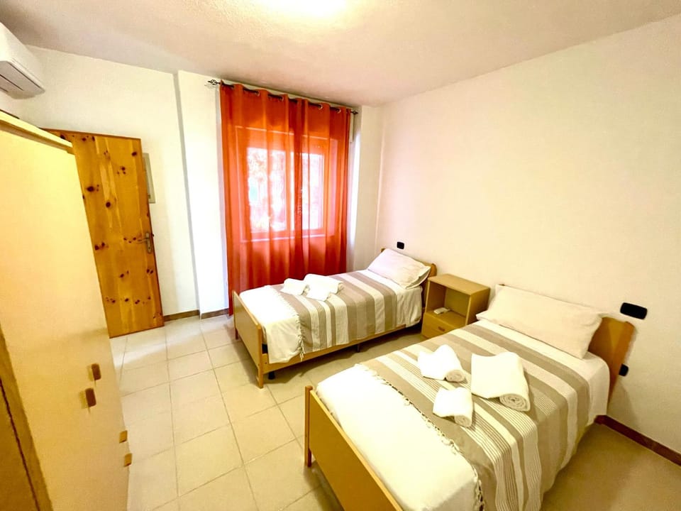 Bed, Bedroom, towels, wardrobe, air conditioner