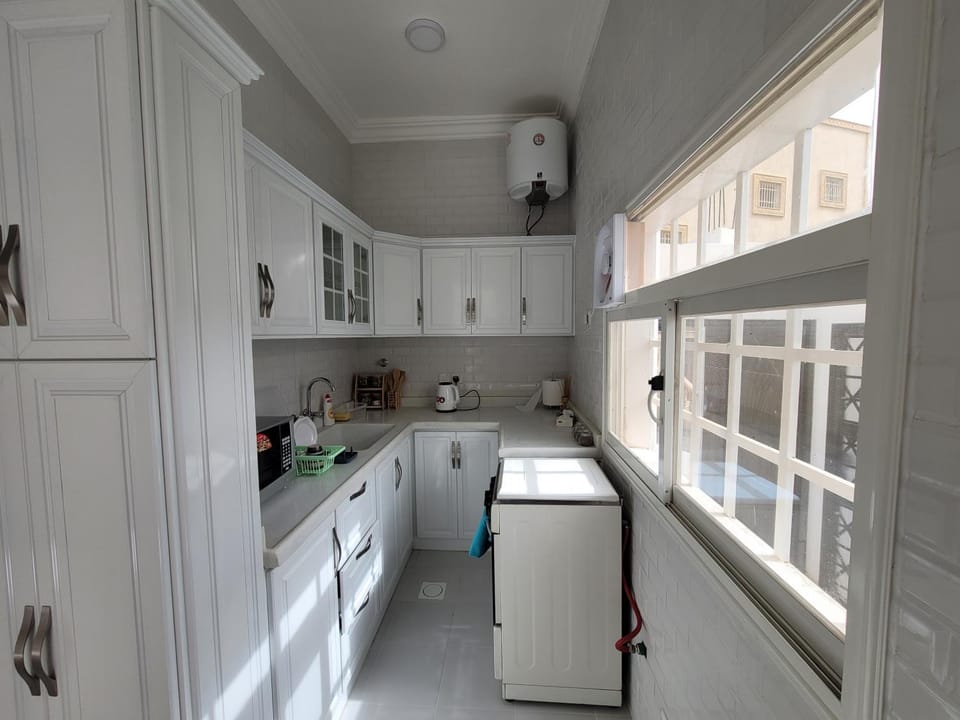 Kitchen or kitchenette, oven, stove