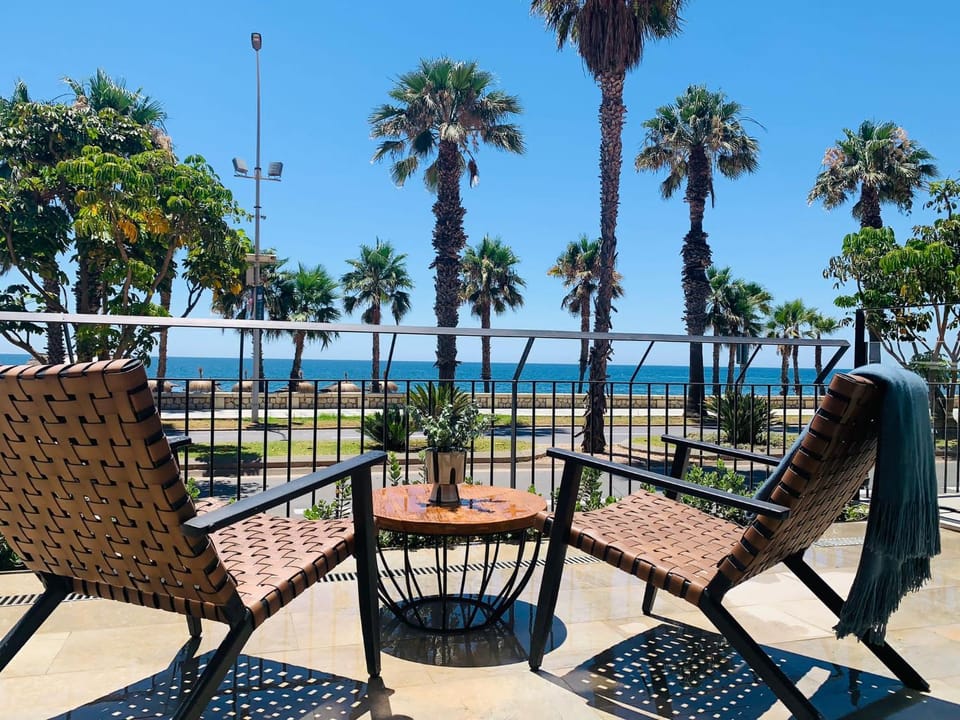 Natural landscape, View (from property/room), Balcony/Terrace, Seating area, Beach, Sea view