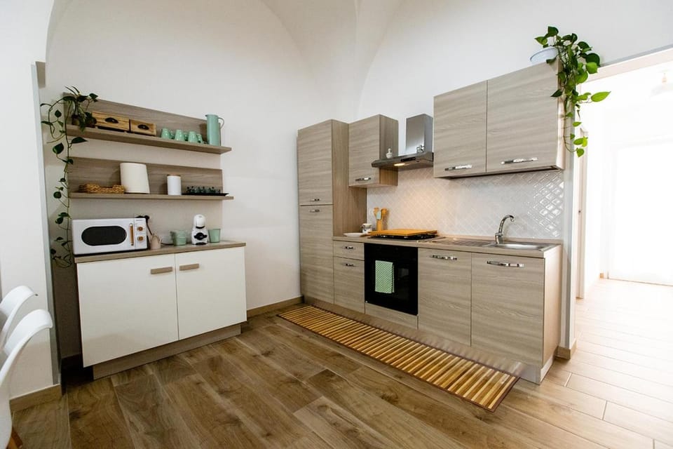 Kitchen or kitchenette, oven, stove
