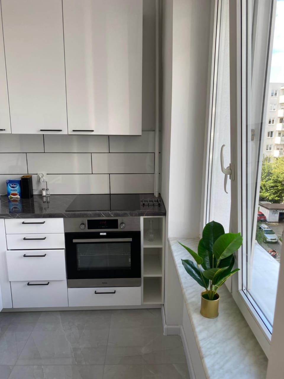 Kitchen or kitchenette, stove