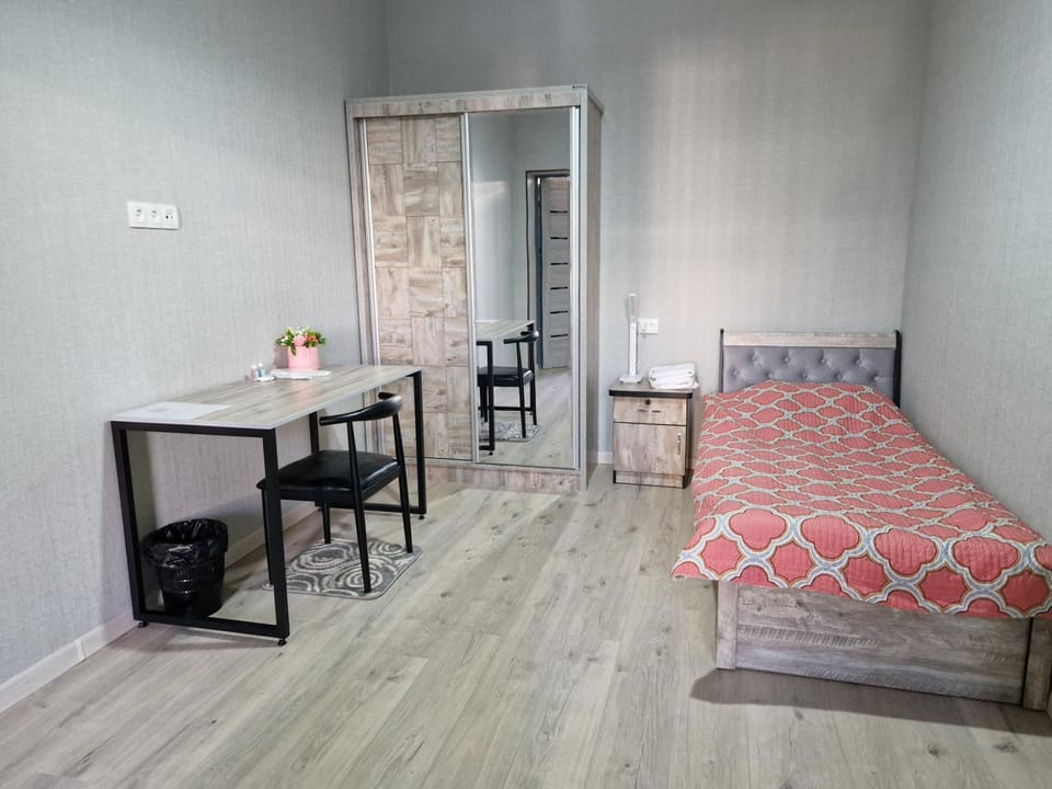 Bed, Dining area, microwave, wardrobe