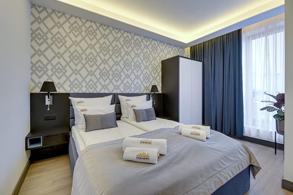 Bed, Photo of the whole room, Seating area, Bedroom, towels, wardrobe