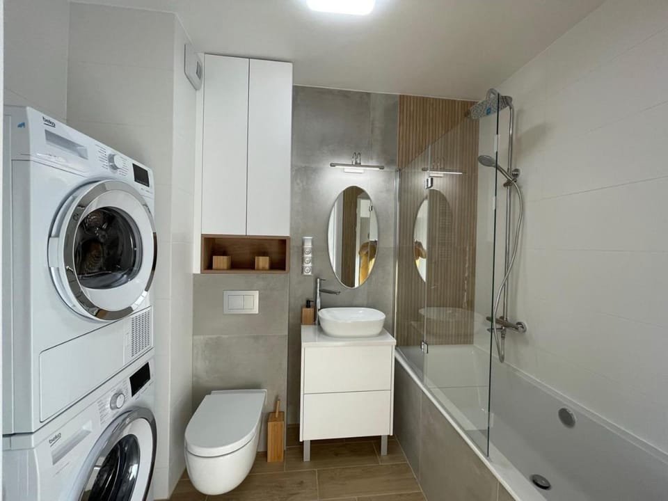 Shower, Toilet, Bathroom, Bath, towels, washing machine, dryer