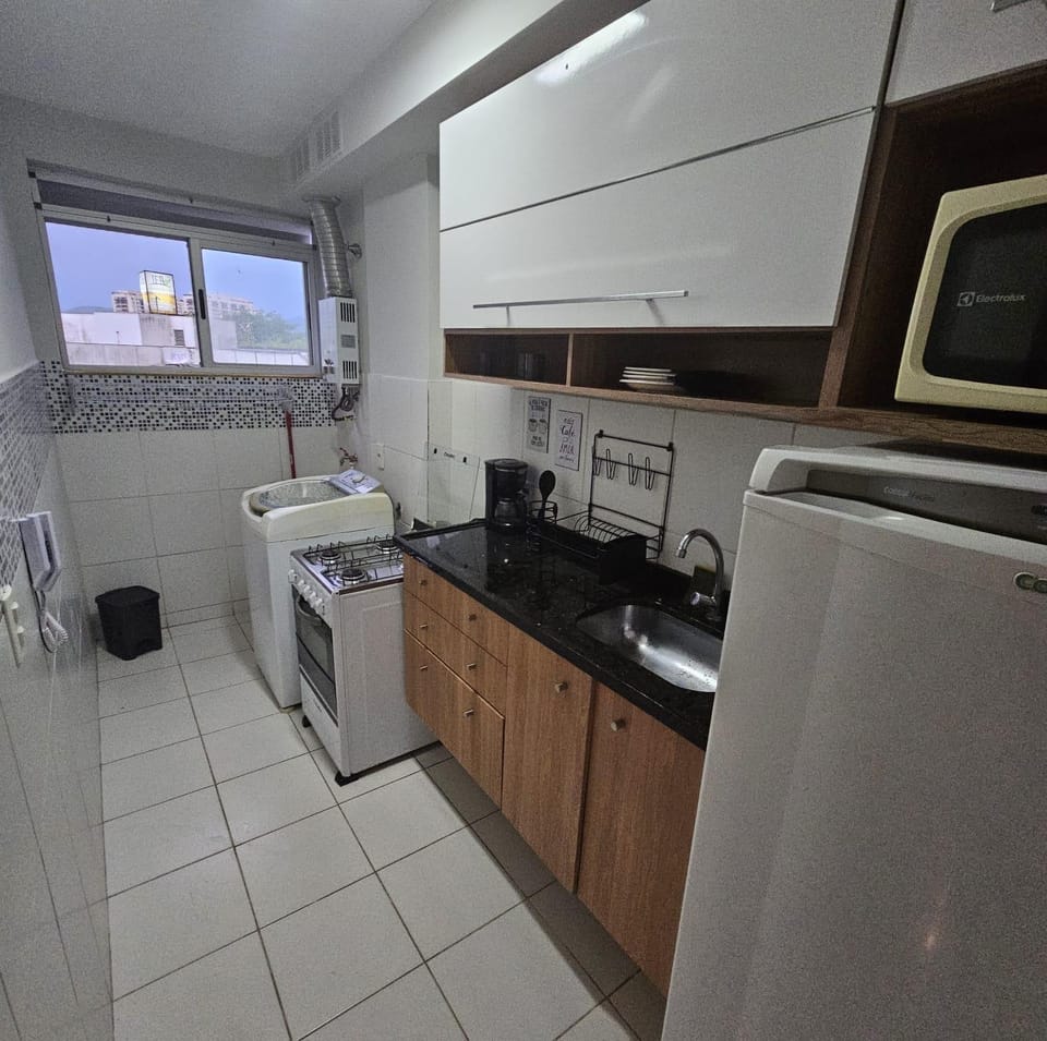 furniture, microwave, oven, stove, washing machine, kitchen
