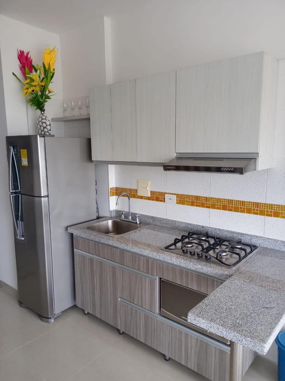 Kitchen or kitchenette, oven, stove