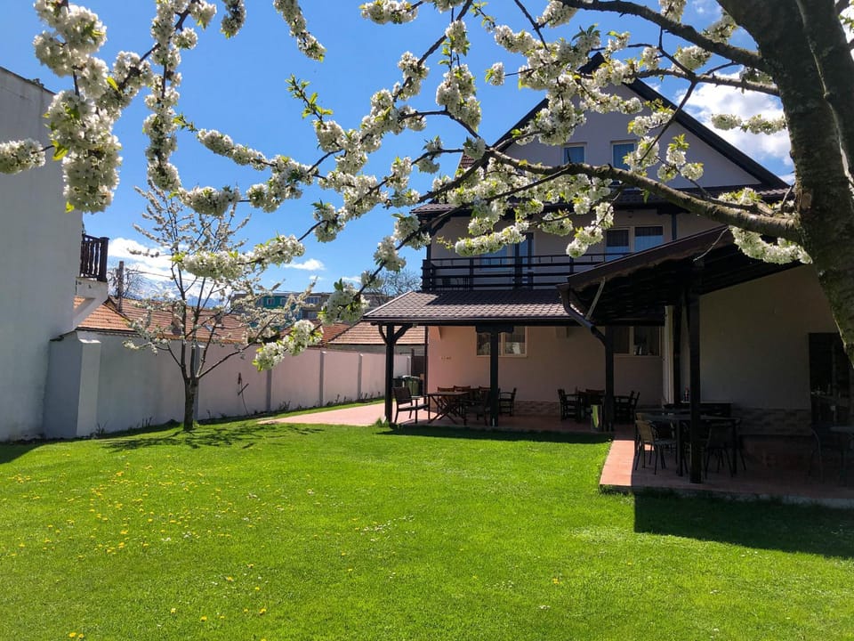 Facade/entrance, Spring, Garden view