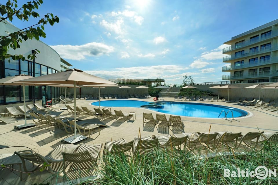 Property building, Day, Natural landscape, Pool view, Swimming pool, Swimming pool, sunbed