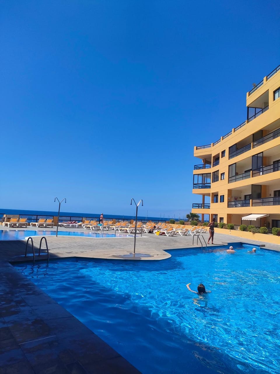 Day, People, Natural landscape, Beach, Pool view, Sea view, Swimming pool, group of guests, sunbed