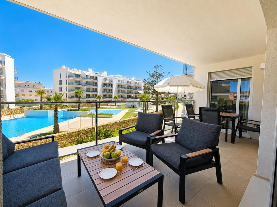 Balcony/Terrace, Seating area, Pool view, Swimming pool