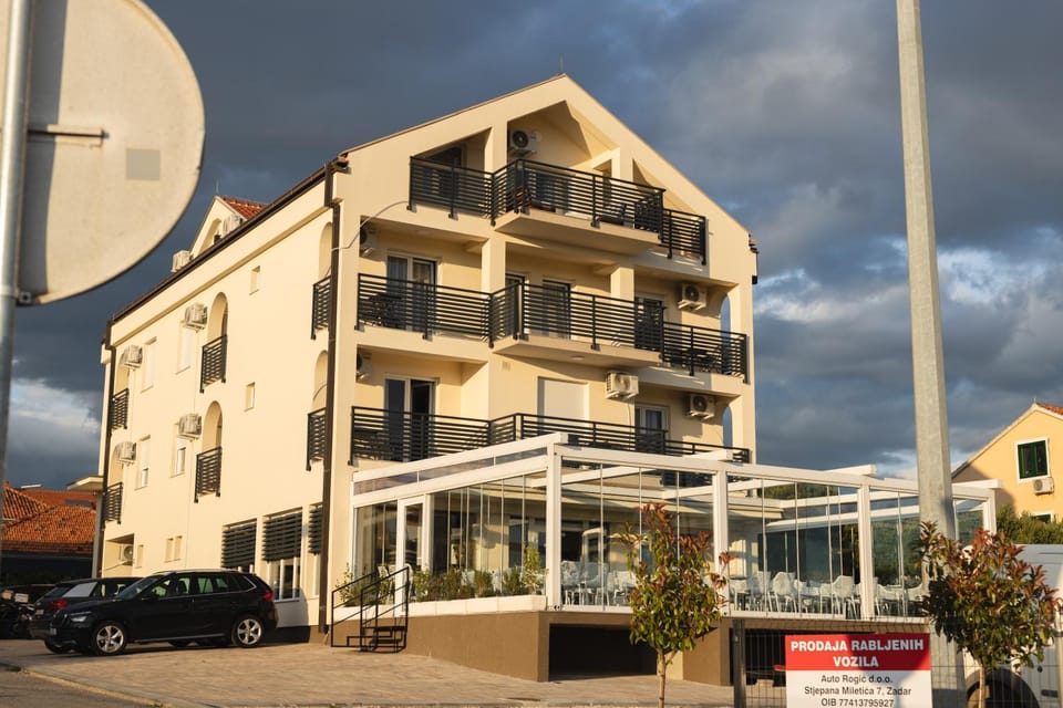 Property building, Day, Location, Parking