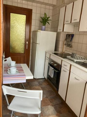 Kitchen or kitchenette, oven, stove