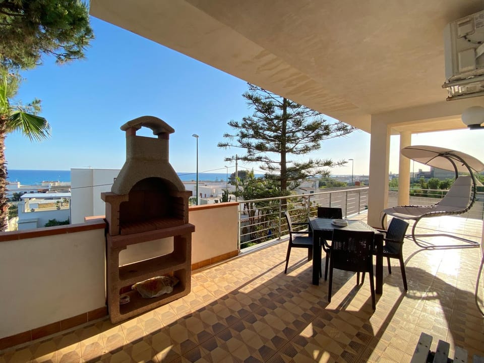Patio, BBQ facilities, Sea view