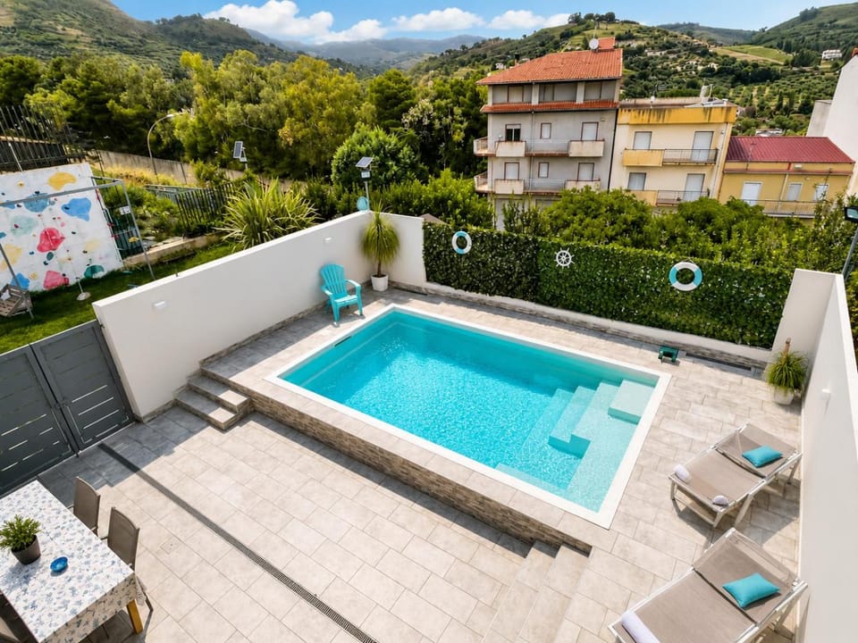 Property building, Patio, View (from property/room), Balcony/Terrace, Pool view, Swimming pool
