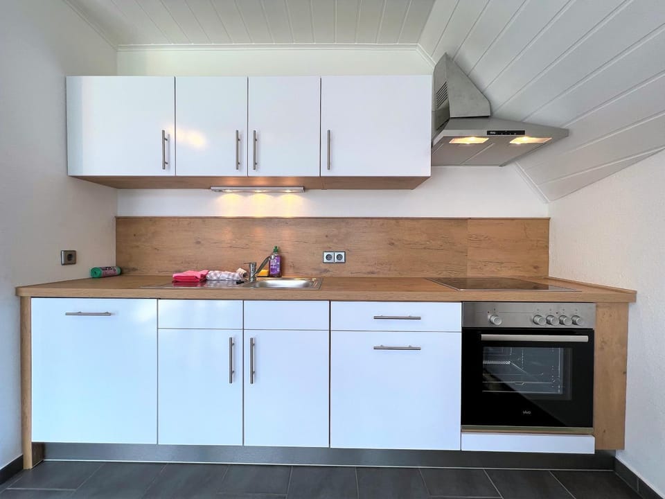 Kitchen or kitchenette, stove