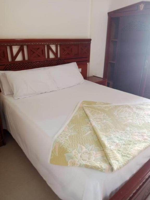 Bed, wardrobe