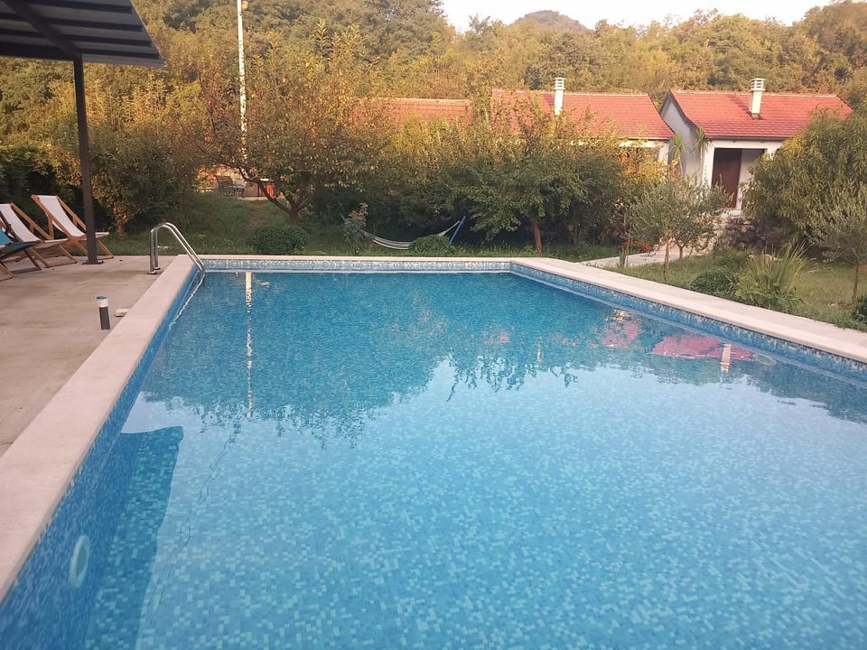 Swimming pool, sunbed